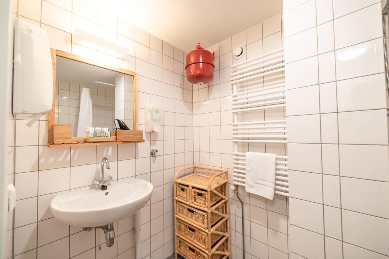 Kamer met 1 Groot Bed of 2 Aparte Bedden en Uitzicht op de Stad